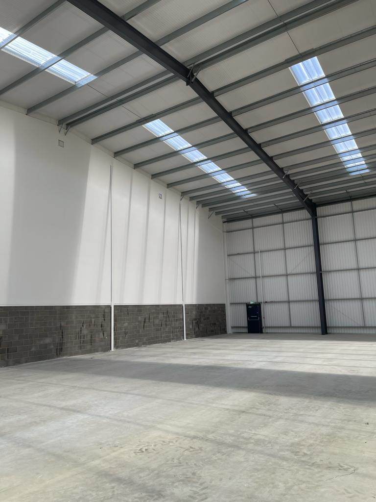 Industrial unit with finished lined walls and blockwork dado